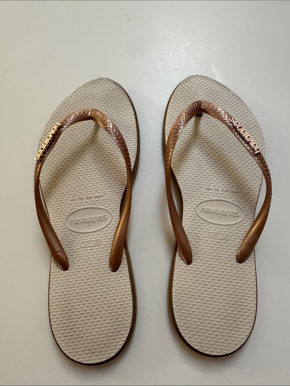 Havaianas Women's Flip Flops in Beige with Metallic Rose Gold Straps